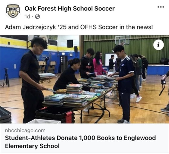 OFHS soccer donate books to Englewood school